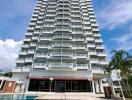 Modern high-rise residential building with pool