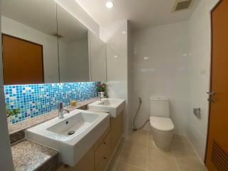 Modern bathroom interior with blue mosaic tiles