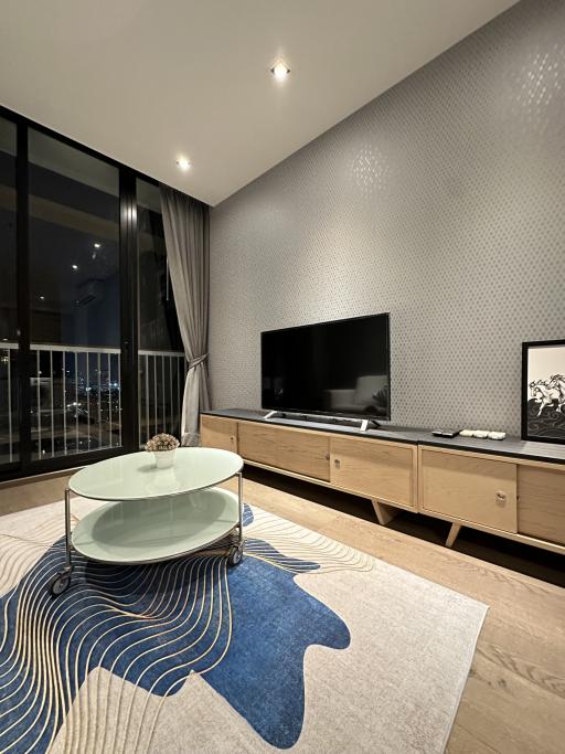 Stylish modern living room with elegant furniture and decorative lighting