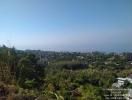 Scenic panorama of a coastal town with clear blue skies