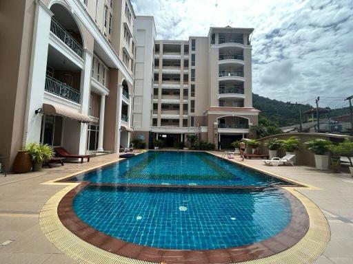 Apartment complex with swimming pool and mountain view