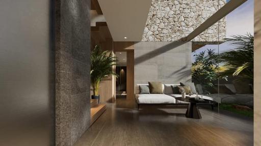 Modern living room with large windows and natural stone wall