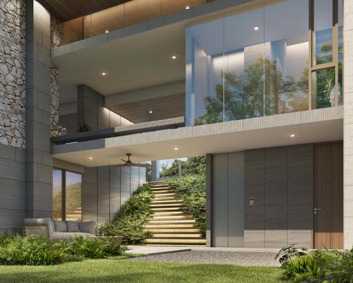 Modern building entrance with staircase and lush greenery