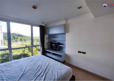 Bright and airy bedroom with a large window