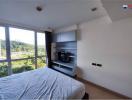 Bright and airy bedroom with a large window