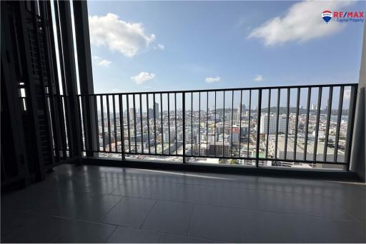 Spacious balcony with city view and safety railing