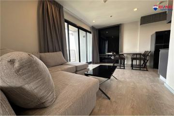 Modern living room interior with comfortable sofa and glass coffee table