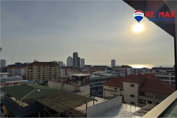 Panoramic city view from balcony at sunset