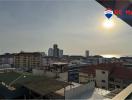 Panoramic city view from balcony at sunset