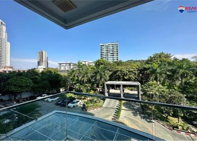 Spacious balcony with a clear view of a sunny urban landscape