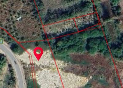 Aerial view of a land plot with demarcations for sale