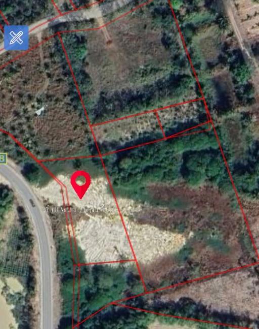 Aerial view of a land plot with demarcations for sale