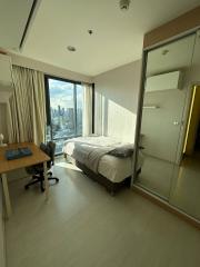 Bright and spacious bedroom with city view