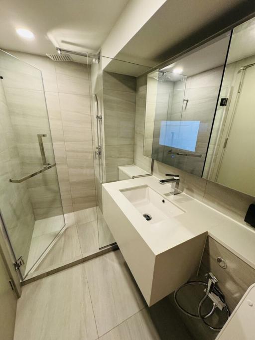 Modern bathroom with glass shower and sleek design