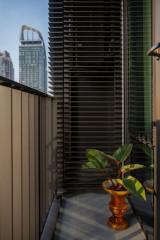 Cozy balcony with urban view and decorative plant