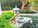 Tranquil garden with decorative fountain and lush greenery