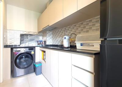 Modern kitchen with stainless steel appliances and ample cabinet space