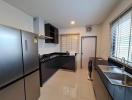 Modern kitchen with stainless steel appliances and ample counter space