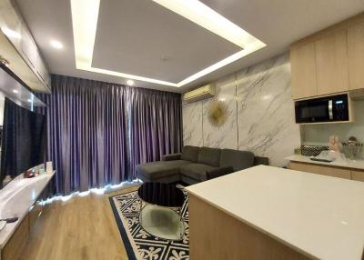 Modern living room with integrated kitchen space