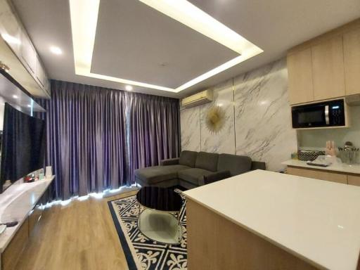 Modern living room with integrated kitchen space