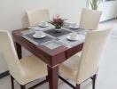 Modern dining room with a table set for four