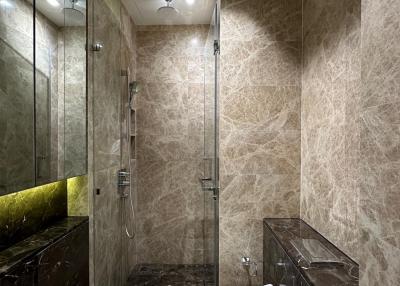 Modern bathroom with shower and luxurious finishes