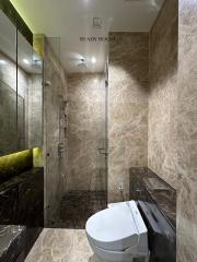 Modern bathroom with shower and luxurious finishes