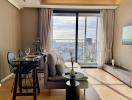 Modern living room with cityscape view through large windows