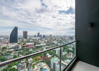 Panoramic city view from high-rise balcony