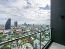 Panoramic city view from high-rise balcony