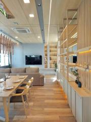 Modern living room with adjacent dining area and elegant decor