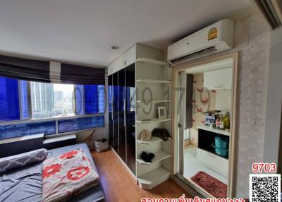 Cozy bedroom with city view and modern amenities