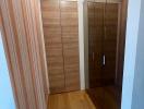Corridor with wooden wardrobe and curtains