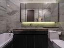 Modern bathroom with marble walls and underlit sink