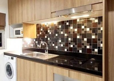 Modern kitchen with wooden cabinets and mosaic backsplash