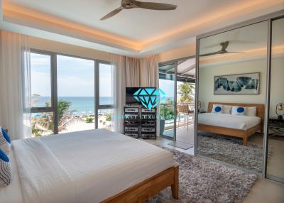 Spacious bedroom with ocean view and modern design
