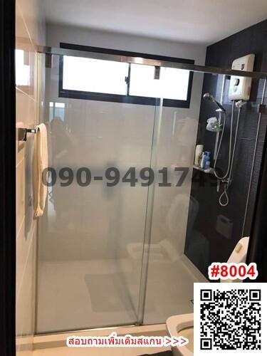 Modern bathroom with glass shower enclosure