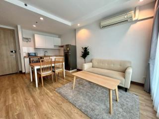 Modern open-plan living room with an integrated kitchen