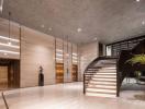 Spacious and modern lobby with elegant stairs and artistic decor