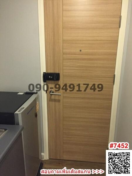 Wooden door entrance with electronic lock