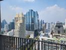 Panoramic cityscape view from high-rise balcony