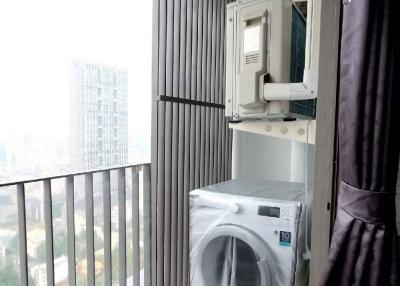 Compact balcony with washing machine and air conditioning unit