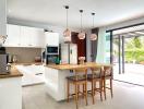 Modern kitchen with central island and pendant lighting