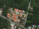 Aerial view of residential area with houses and greenery