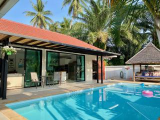 Modern home with pool and garden view