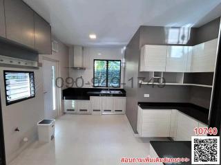 Modern kitchen with sleek cabinetry and stainless steel appliances