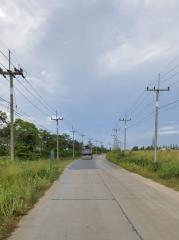 Street view with electric poles and a clear sky
