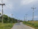 Street view with electric poles and a clear sky