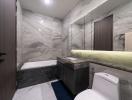 Modern bathroom with marble finish and bathtub