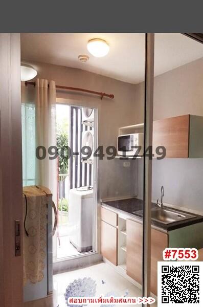 Compact kitchen with window and steel sink